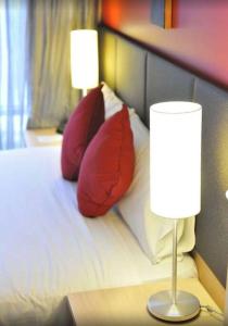 En eller flere senge i et værelse på Melbourne boutique hotel