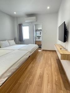 The CK Hotel客房内的一张或多张床位