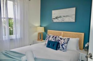 Llit o llits en una habitació de Charming Mountain Escape - Katoomba