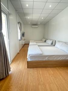 The CK Hotel客房内的一张或多张床位