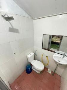 a bathroom with a toilet and a sink at B'first Chalet Perhentian Island in Kuala Besut