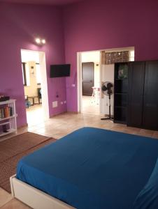 Postel nebo postele na pokoji v ubytování Casa Scirocco IUN Q2421