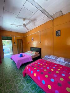 Postel nebo postele na pokoji v ubytování B'first Chalet Perhentian Island