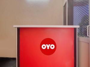 a red box with the ovo logo on it at G7 Residency in Pargi