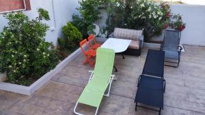 A seating area at Serenity Villa-1st floor-Sea view- sea 150m away