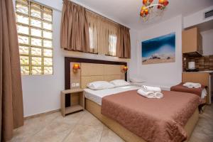 En eller flere senge i et værelse på Sea Pearl Luxury Apartments + 91 billeder