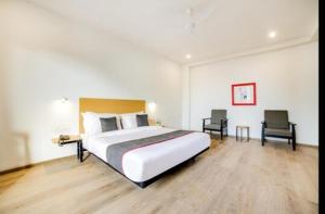 Postel nebo postele na pokoji v ubytování Hotel Wedlock subhash chowk Gurgaon + 23 fotografií