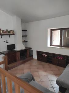 TV a/nebo společenská místnost v ubytování A CASA DI GIÒ & GIÒ