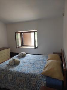 Postel nebo postele na pokoji v ubytování A CASA DI GIÒ & GIÒ