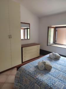 Postel nebo postele na pokoji v ubytování A CASA DI GIÒ & GIÒ