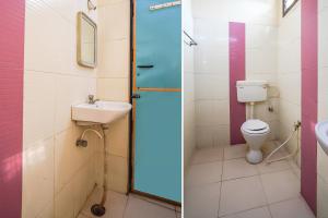 ヴィシャカパトナムにあるFabHotel Sai Nationalのバスルーム(トイレ、洗面台付)