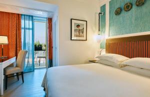 Postel nebo postele na pokoji v ubytování Boutique Hotel Esplanade