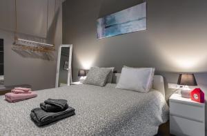 Postel nebo postele na pokoji v ubytování Ceramus Apartments Gazi View