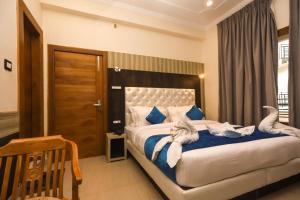 Letto o letti in una camera di The Nest with open rooftop cafe Mecleodganj