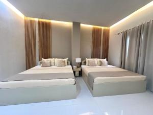 Cama o camas de una habitación en Hotel Nicanor