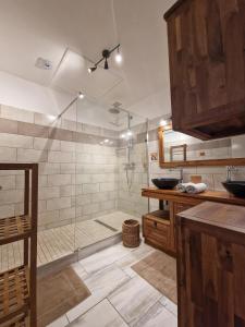 Koupelna v ubytování Maison du piton st leu, vue mer
