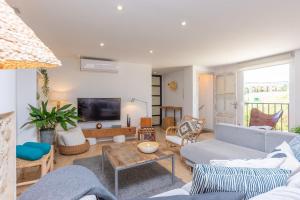 a living room with a couch and a table at Casa Gema in Selva