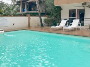 A piscina em ou perto de Rainforest Enclave, Arpora - 10 mins to Baga beach
