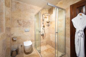 A bathroom at Cappadocia Pegasos Cave Suite Hotel