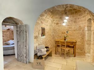 Posedenie v ubytovaní Trulli Lamascrasciola