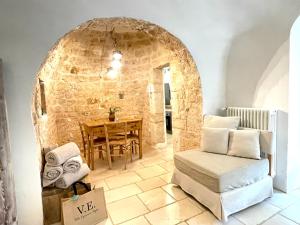 Posedenie v ubytovaní Trulli Lamascrasciola
