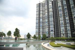 a rendering of a large apartment building with a fountain at Cozy Hyve Soho Sky View With Wifi Netflix & Parkin 116 in Cyberjaya