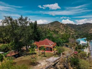 an aerial view of a house on a hill at GILI VIEW By Kalma in Teluknarat