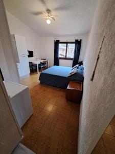 Postel nebo postele na pokoji v ubytování Casa Viola + 10 fotografií