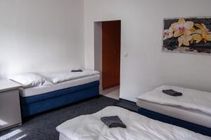 Katil atau katil-katil dalam bilik di Hotel Joker