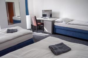 Katil atau katil-katil dalam bilik di Hotel Joker