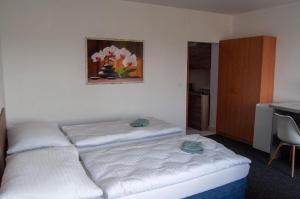 Katil atau katil-katil dalam bilik di Hotel Joker