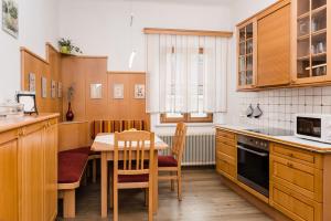 Kuchyň nebo kuchyňský kout v ubytování Central-Inn Werfen