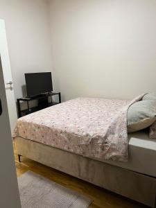 Uma cama ou camas num quarto em Apartment Mari Mari