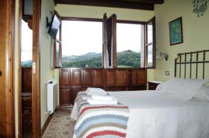 Cama o camas de una habitación en Balcón Picos de Europa