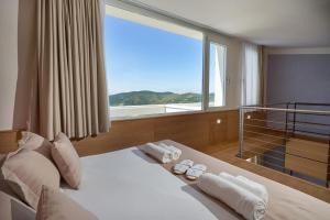 A bed or beds in a room at Torre Difyos