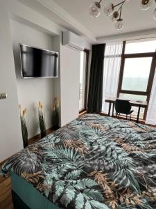 A bed or beds in a room at Dolce Vita Premium Apartment Panorama Sea View