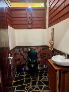 Vonios kambarys apgyvendinimo įstaigoje Logement meublé « Atiala »