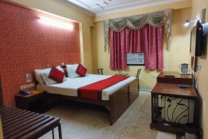 TV a/nebo společenská místnost v ubytování Hotel Indraprastha + 37 fotografií