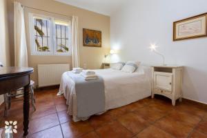 Posteľ alebo postele v izbe v ubytovaní Villa Bella Costa by Abahana Villas