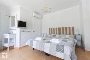 Posteľ alebo postele v izbe v ubytovaní Villa Bella Costa by Abahana Villas