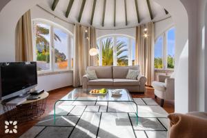 Posedenie v ubytovaní Villa Bella Costa by Abahana Villas