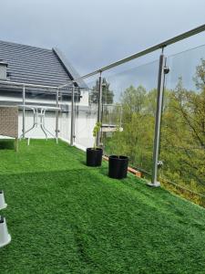 Vonkajšia záhrada v ubytovaní LAGUNA Apartament Polanica Residence 59 z klimatyzacją