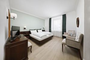 TV a/nebo společenská místnost v ubytování Hotel Isabella