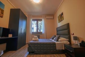 Postel nebo postele na pokoji v ubytování Agriturismo Rascioni & Cecconello