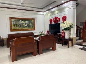 Un televizor și/sau centru de divertisment la Hoàng Anh Hotel Lào Cai - by Bay Luxury