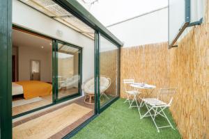 Postel nebo postele na pokoji v ubytování Beira Mar Sunny Patio