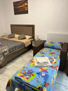 En eller flere senge i et værelse på Garsoniera la Mare