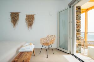 Кровать или кровати в номере Melianthos Villas