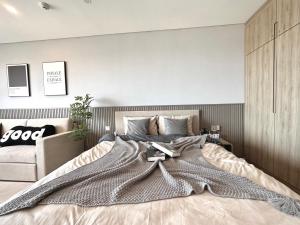 מיטה או מיטות בחדר ב-Song's Apartment - Căn Hộ Du Lịch Biển Vũng Tàu