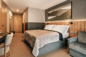 Voodi või voodid majutusasutuse Atrium Hotel - Family friendly toas